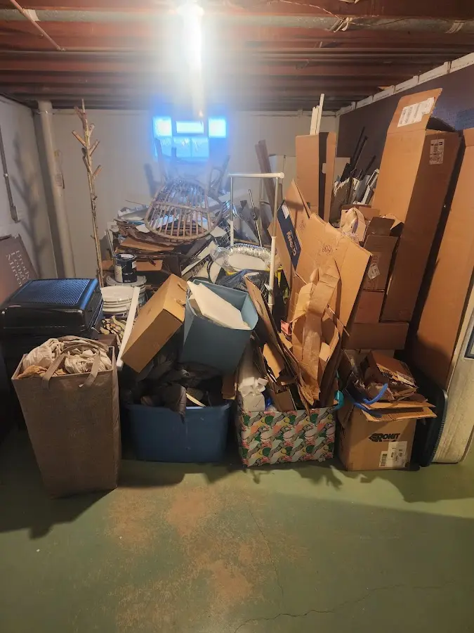 Roll-off dumpster container at job site for 2 Yard Dumpster Rental in Blair